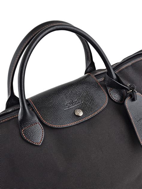 sac de voyage longchamp femme.